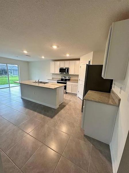 Furnished interior view inside a new home in , Wimauma (Image 26).