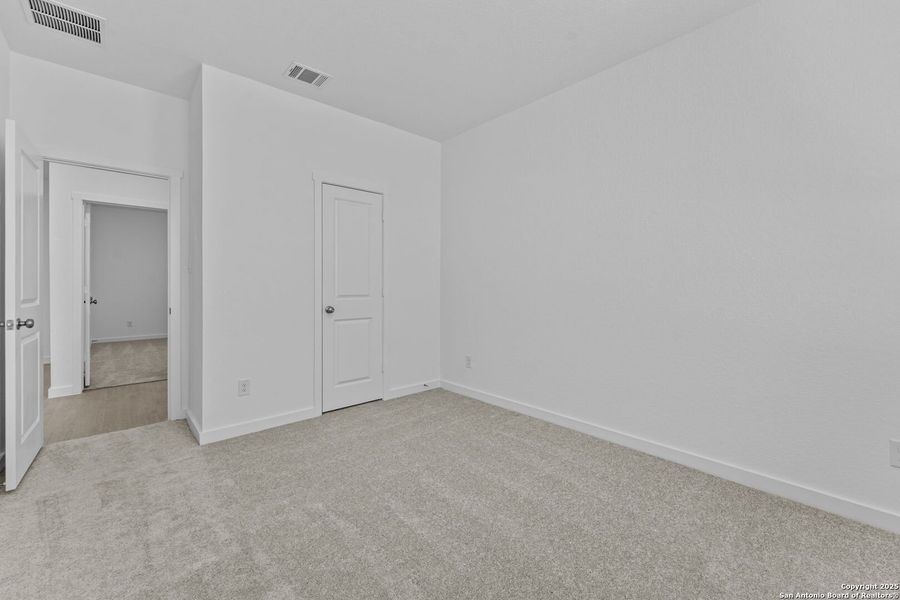 Spacious, unfurnished interior of a new home in Waterwheel: Coastline Collection, San Antonio (Image 23).