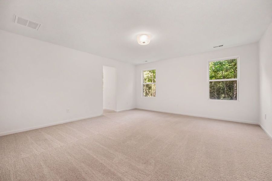 Spacious, unfurnished interior of a new home in Lake Royale, Louisburg (Image 15).