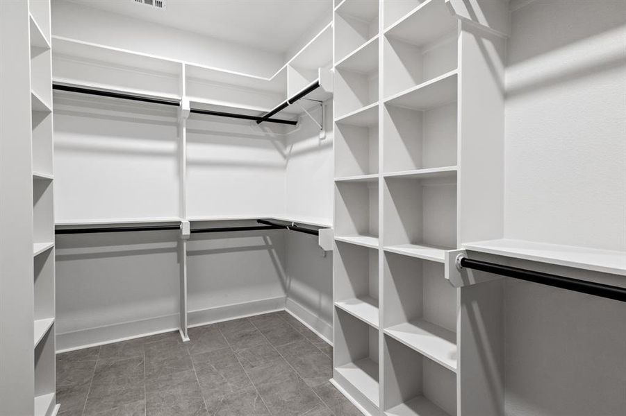Walk in closet featuring light tile patterned floors