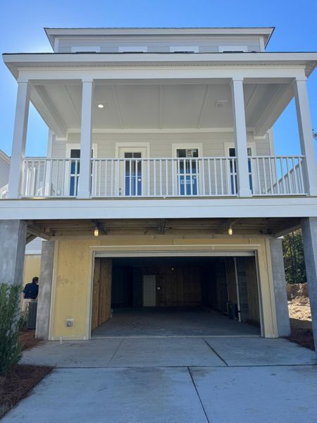 Exterior details and patio area of a home in Indigo Grove Single Family Homes, Johns Island (Image 4).