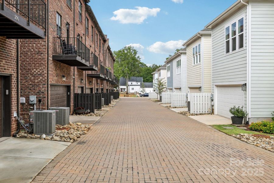 Exterior details and patio area of a home in Walk23, Huntersville (Image 22).