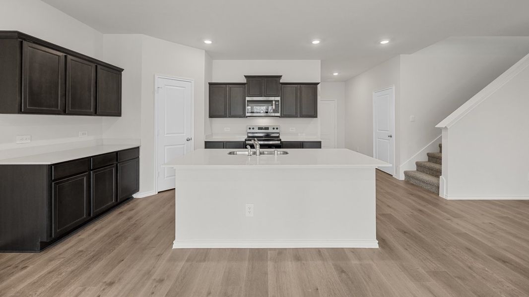 Furnished interior view inside a new home in Crane Crossing, Crandall (Image 5).