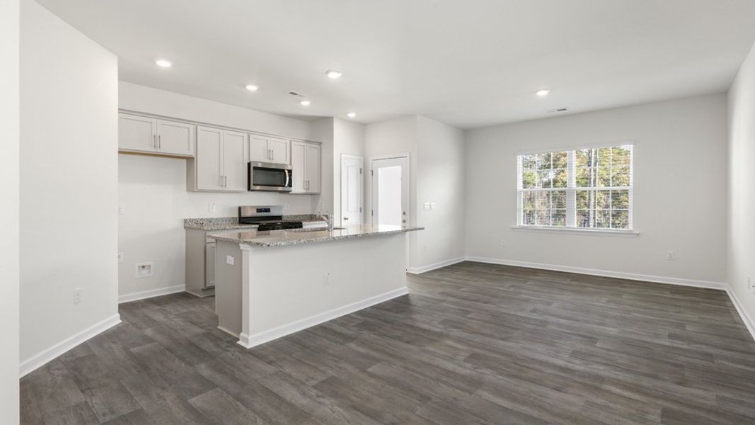 Furnished interior view inside a new home in The Townes at Galvins Ridge, Sanford (Image 8).