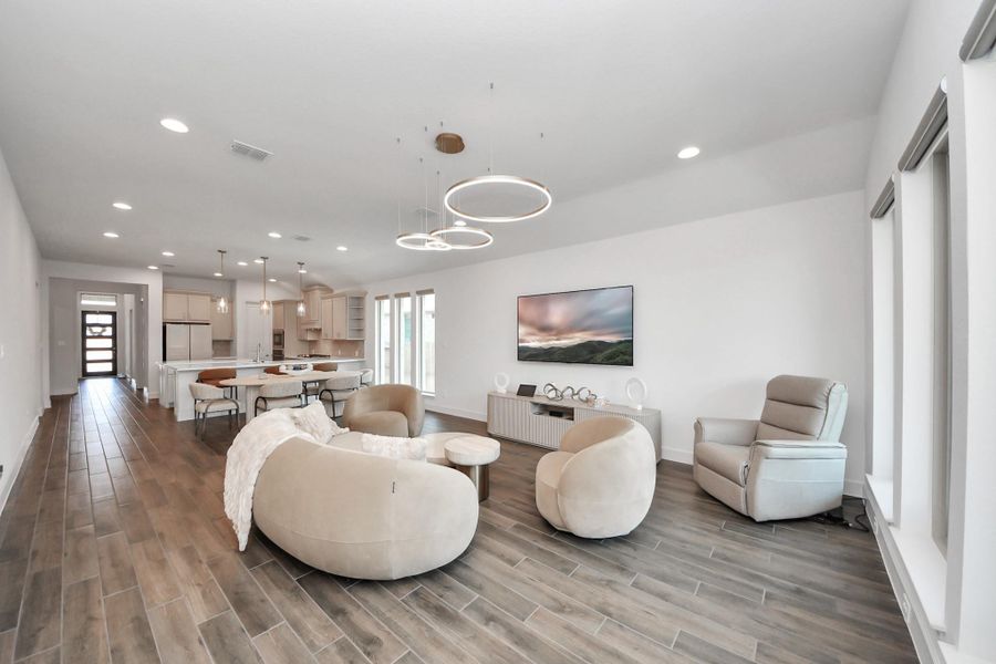 Custom light fixtures and open floor plan!