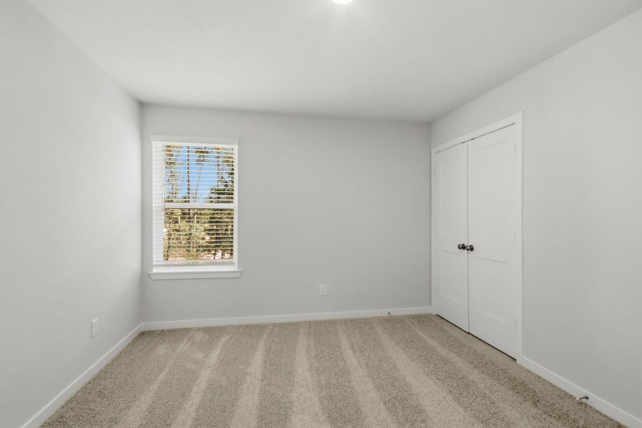 Spacious, unfurnished interior of a new home in The Woodlands Hills, Willis (Image 17).