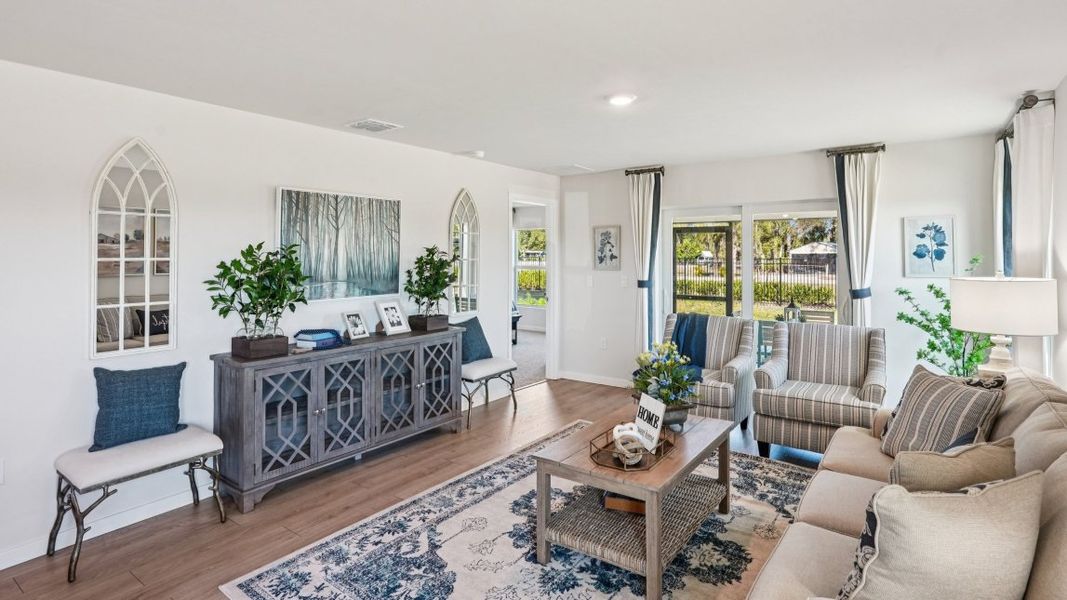 Furnished interior view inside a new home in Coral Bay - Express & Tradition, North Fort Myers (Image 8).