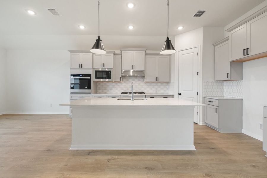 Furnished interior view inside a new home in Sage Hollow, Kyle (Image 7).