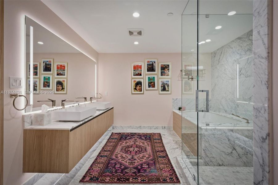 Primary bath with dual sinks and Roman tub