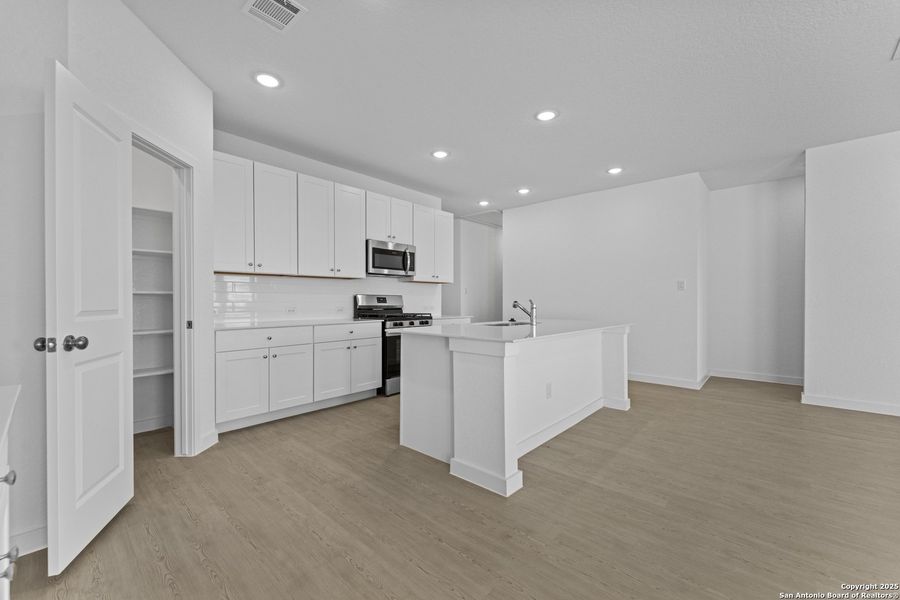 Furnished interior view inside a new home in Waterwheel, San Antonio (Image 7).