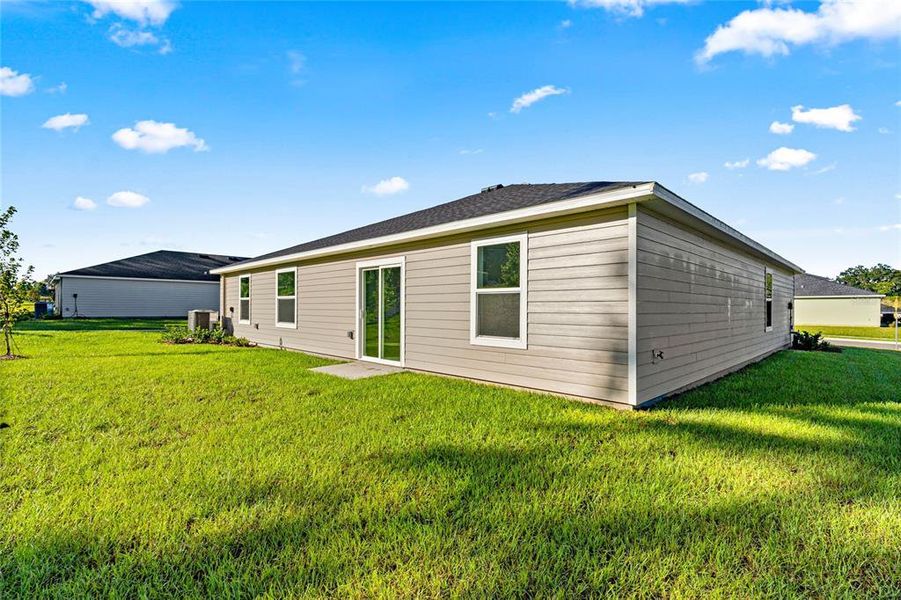 Exterior details and patio area of a home in Marion Ranch, Ocala (Image 4).