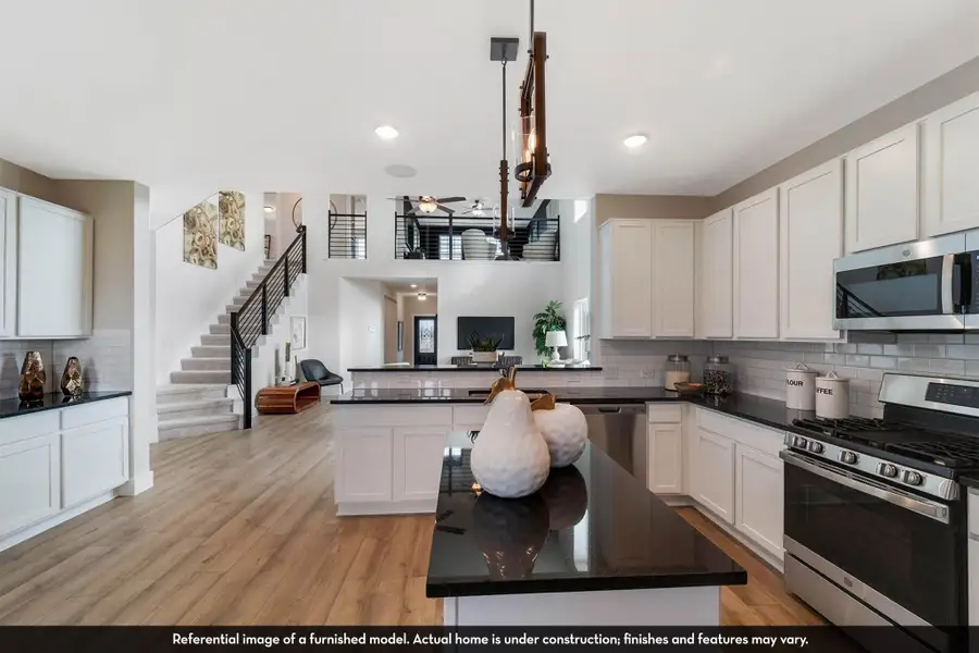 Furnished interior view inside a new home in Caney Mills, Conroe (Image 12).