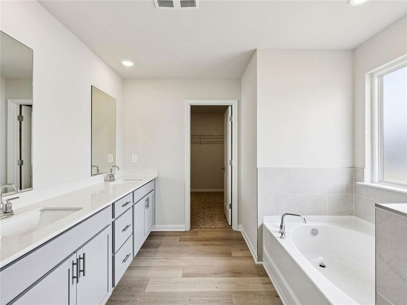 Furnished interior view inside a new home in Harmony Manor, Fairburn (Image 8).