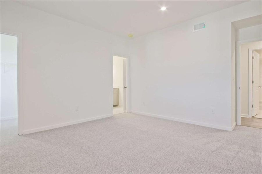 Spacious, unfurnished interior of a new home in The Paddocks at Doc Hughes, Buford (Image 29).