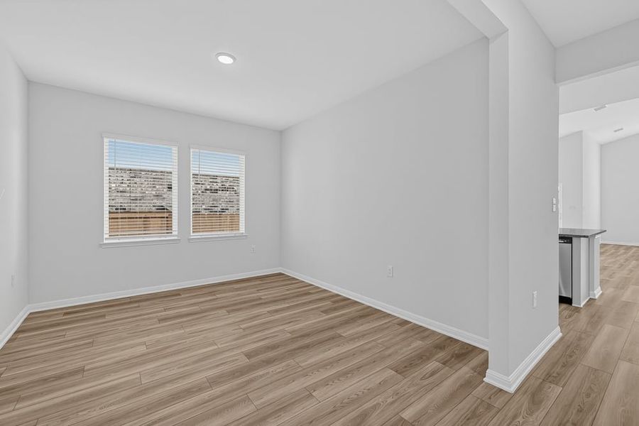 Representative unfurnished interior of a home built from the Warbler by Taylor Morrison in Emory Crossing, Hutto (Image 11).