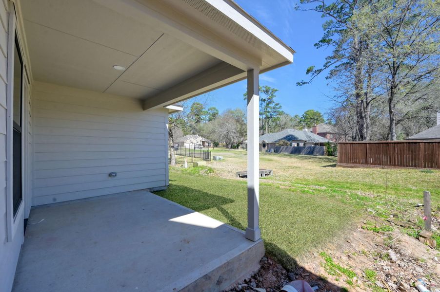 Step outside to your private covered patio, an ideal spot for morning coffee or weekend BBQs while overlooking the sprawling backyard.