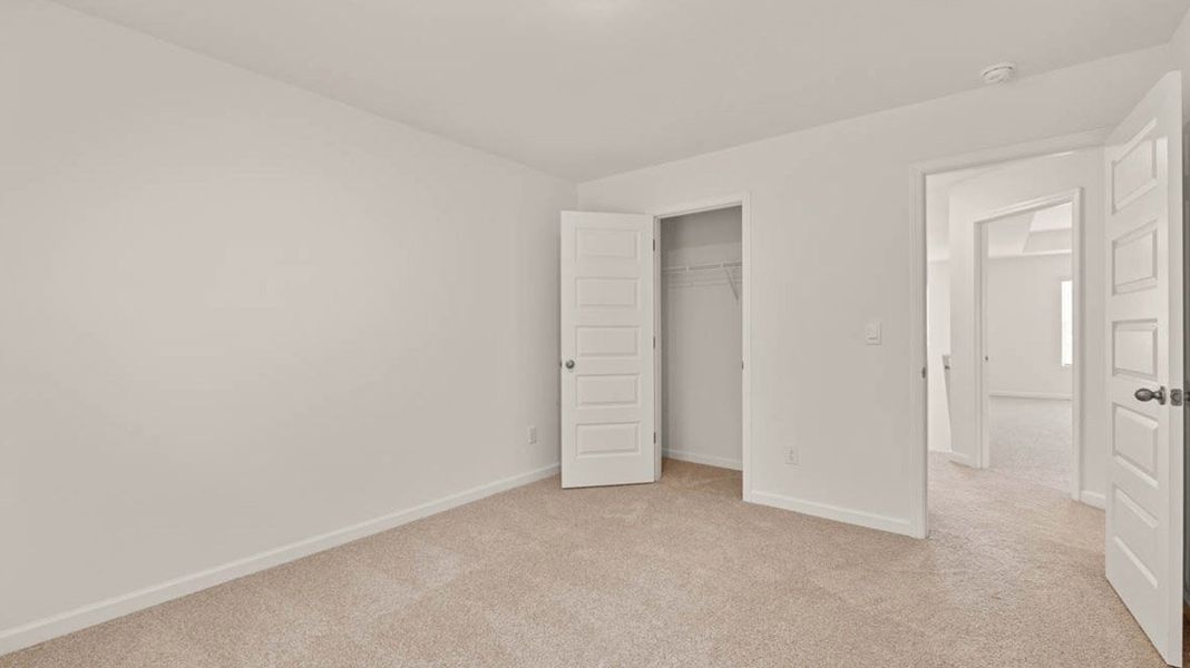 Representative unfurnished interior of a home built from the Packard by D.R. Horton in Evergreen Crossing, Locust Grove (Image 30).