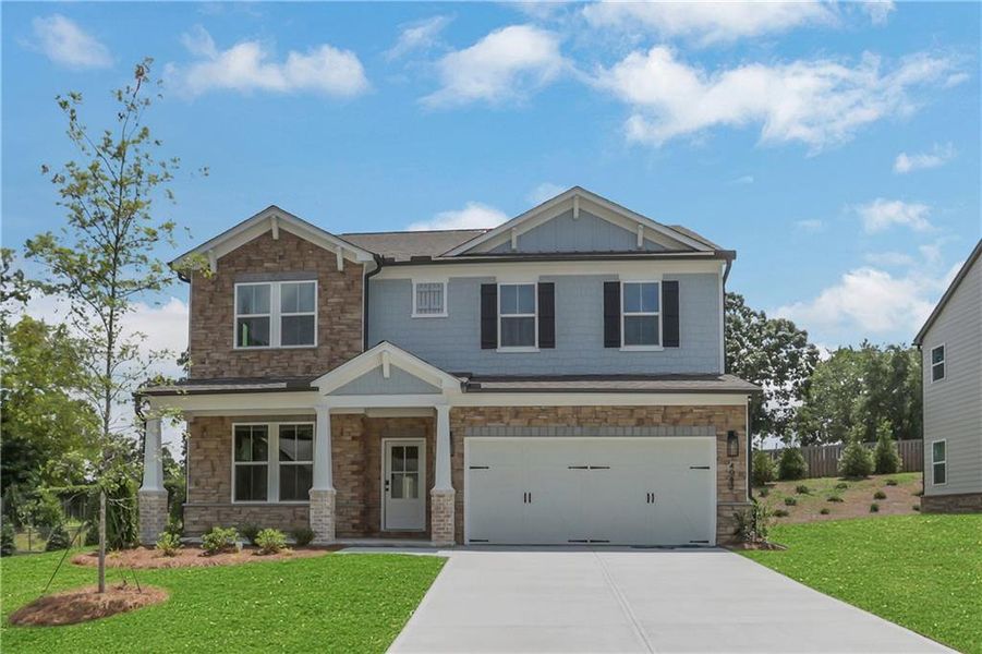 Front exterior of a new home in The Paddocks at Doc Hughes, Buford, GA, highlighting curb appeal (Image 2). Front exterior of a new home in The Paddocks at Doc Hughes, Buford, GA, highlighting curb appeal (Image 2).