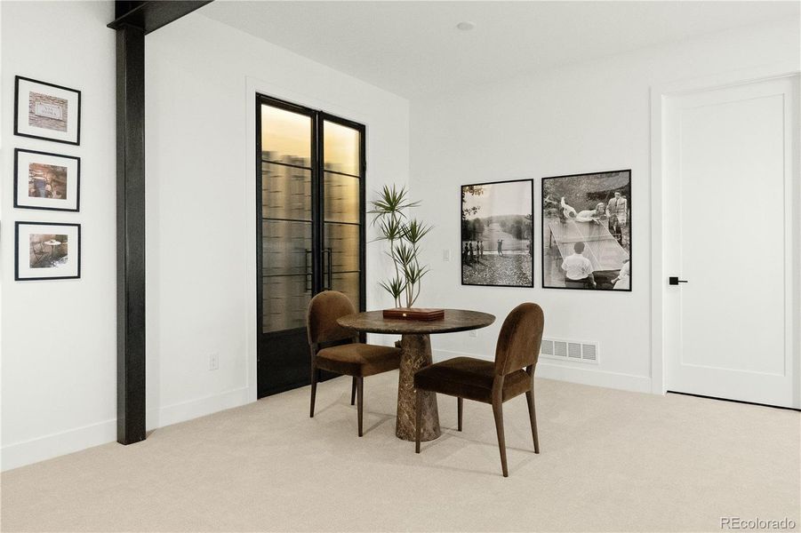 Furnished interior view inside a new home in Signature at Crystal Valley, Castle Rock (Image 1).