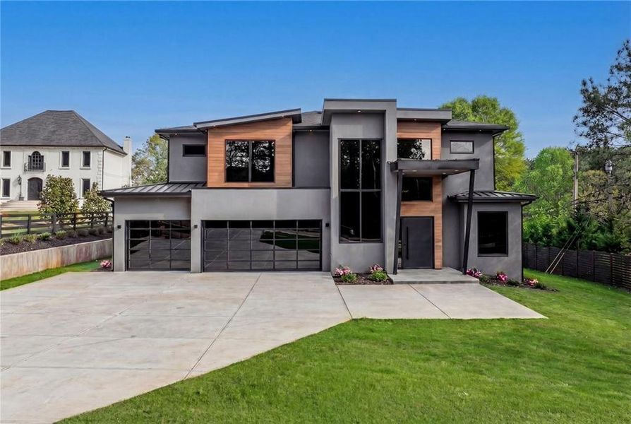 Front exterior of a new home in , Sugar Hill, GA, highlighting curb appeal (Image 2). Front exterior of a new home in , Sugar Hill, GA, highlighting curb appeal (Image 2).