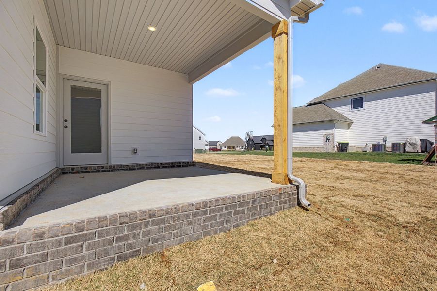 Exterior details and patio area of a home in The Oaks, Clarksville (Image 4).