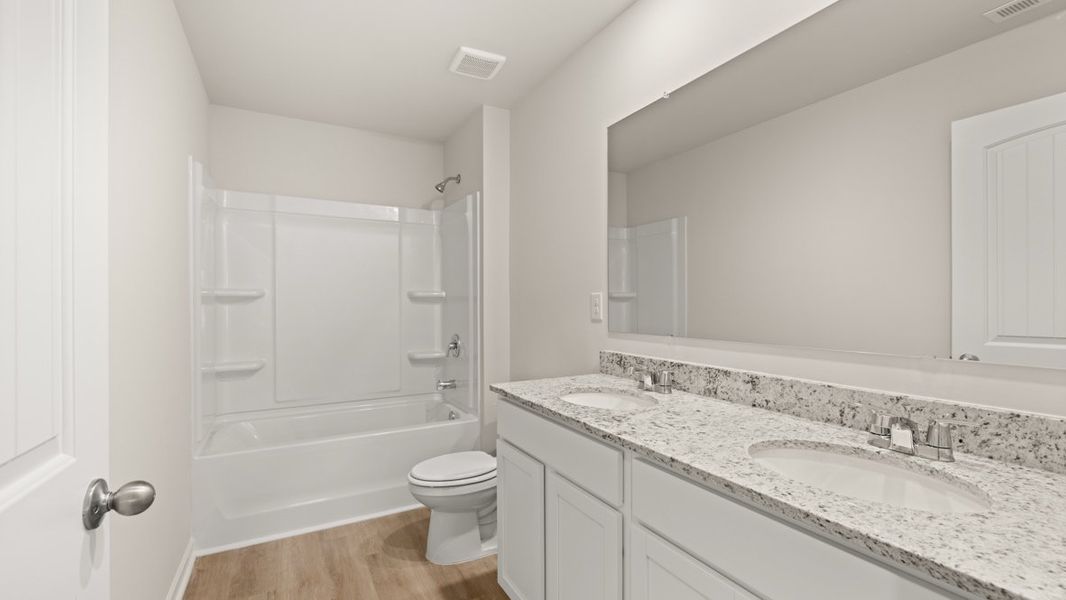 Representative furnished interior of a home built from the Robie by D.R. Horton in Oconee Overlook, Gainesville (Image 14). Representative furnished interior of a home built from the Robie by D.R. Horton in Oconee Overlook, Gainesville (Image 14).
