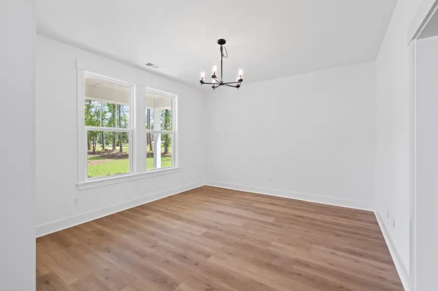 Spacious, unfurnished interior of a new home in Long Bay Golf Club, Longs (Image 17).