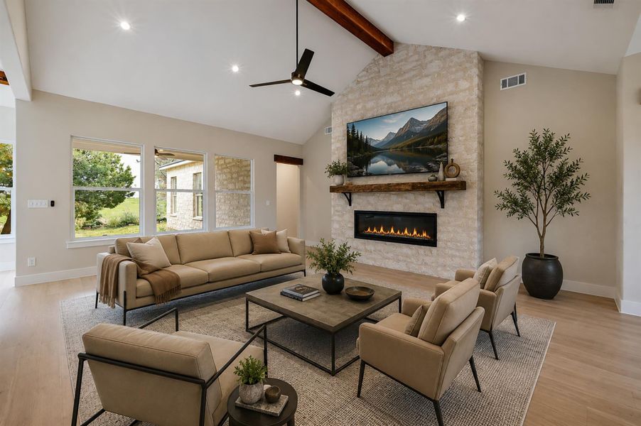 Virtual Staging. An impressive stone fireplace rises to meet the vaulted ceiling in this open living area. Virtual Staging. An impressive stone fireplace rises to meet the vaulted ceiling in this open living area.