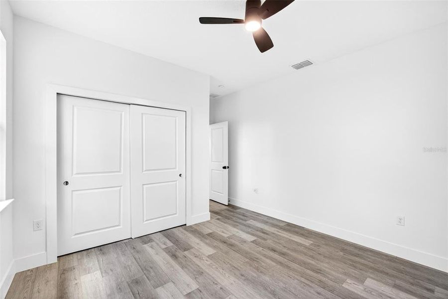 Spacious, unfurnished interior of a new home in , Port Charlotte (Image 27).