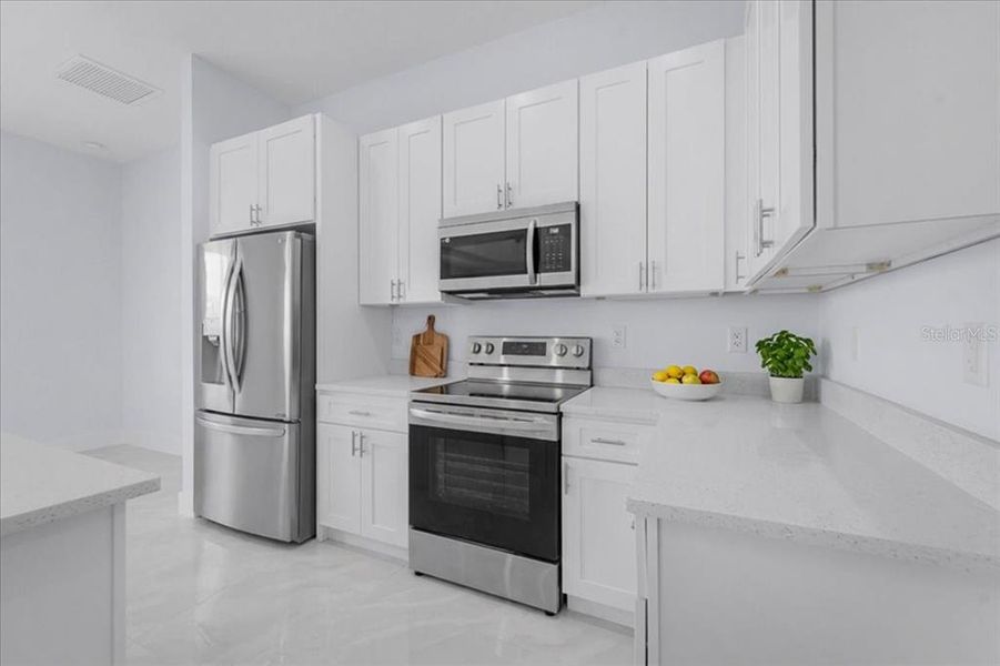 Furnished interior view inside a new home in , Lehigh Acres (Image 11). Furnished interior view inside a new home in , Lehigh Acres (Image 11).