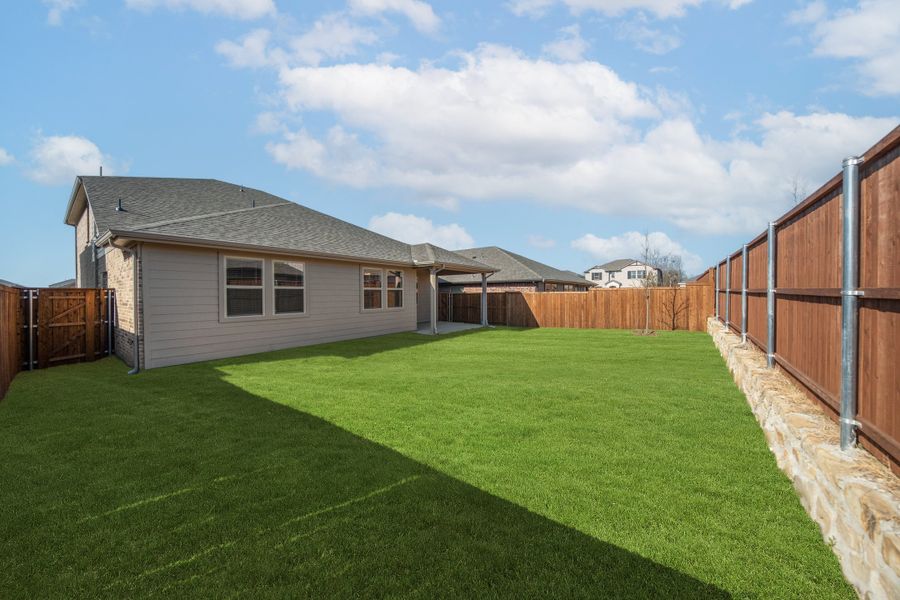 Exterior details and patio area of a home in Chalk Hill, Celina (Image 2).