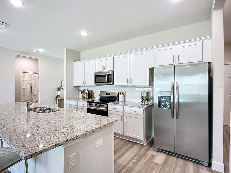 Furnished interior view inside a new home in , North Port (Image 43).