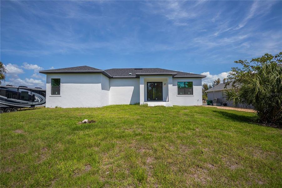 Exterior details and patio area of a home in , Port Charlotte (Image 3).