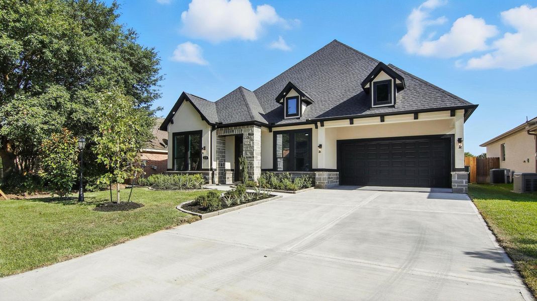 Front exterior of a new home in , Montgomery, TX, highlighting curb appeal (Image 2). Front exterior of a new home in , Montgomery, TX, highlighting curb appeal (Image 2).