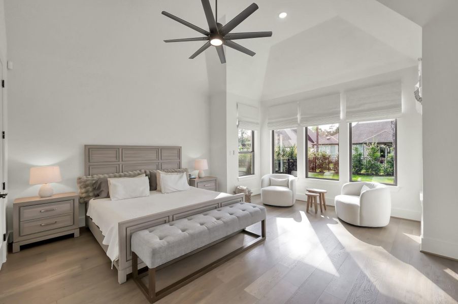 The spacious primary suite offers a peaceful retreat at the end of the day.