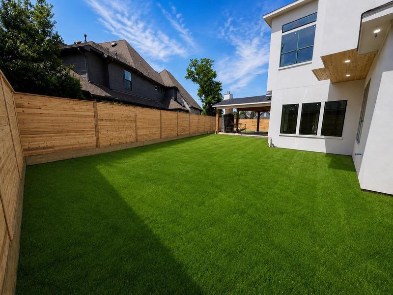 Large Back Yard. Plenty room for a pool Photos are enhanced.