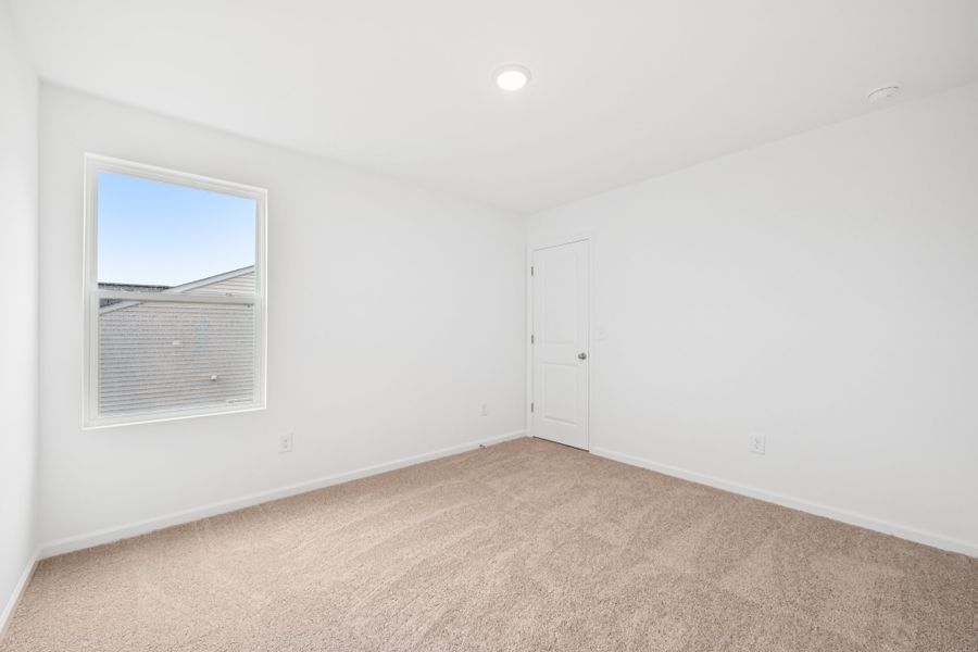 Representative unfurnished interior of a home built from the Brooke by Ashton Woods in Middleton Farms, Middlesex (Image 18).
