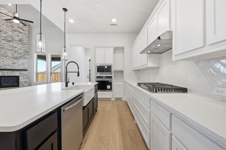 Furnished interior view inside a new home in Wildridge, Oak Point (Image 7).