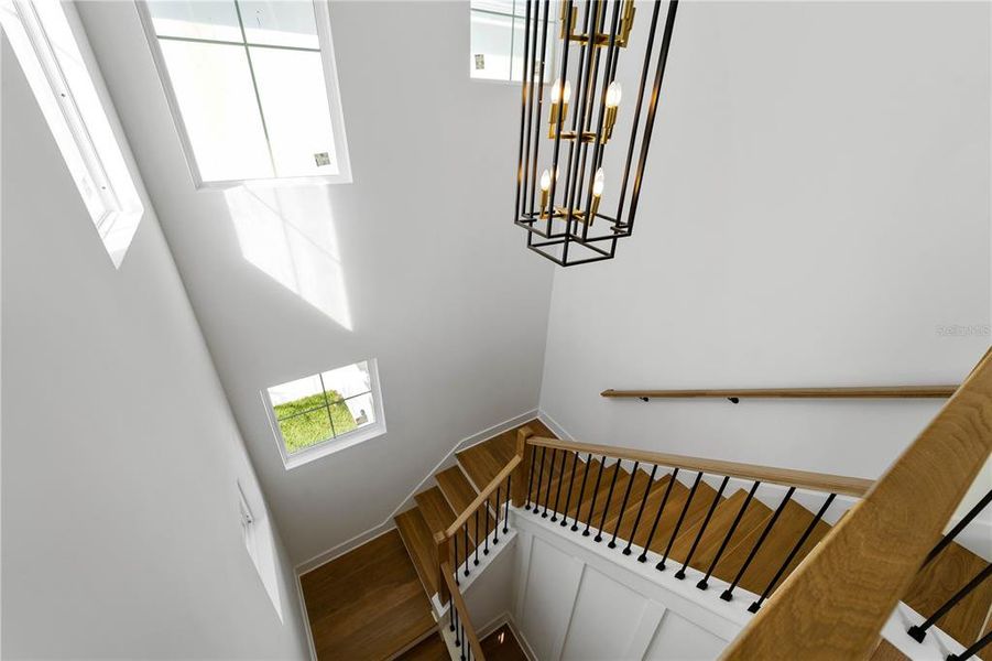 Jaw Dropping Stairwell w/Chandelier.