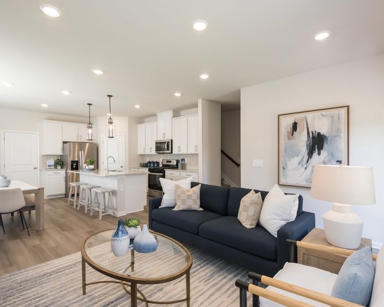 The kitchen overlooks into the dining room and living room.