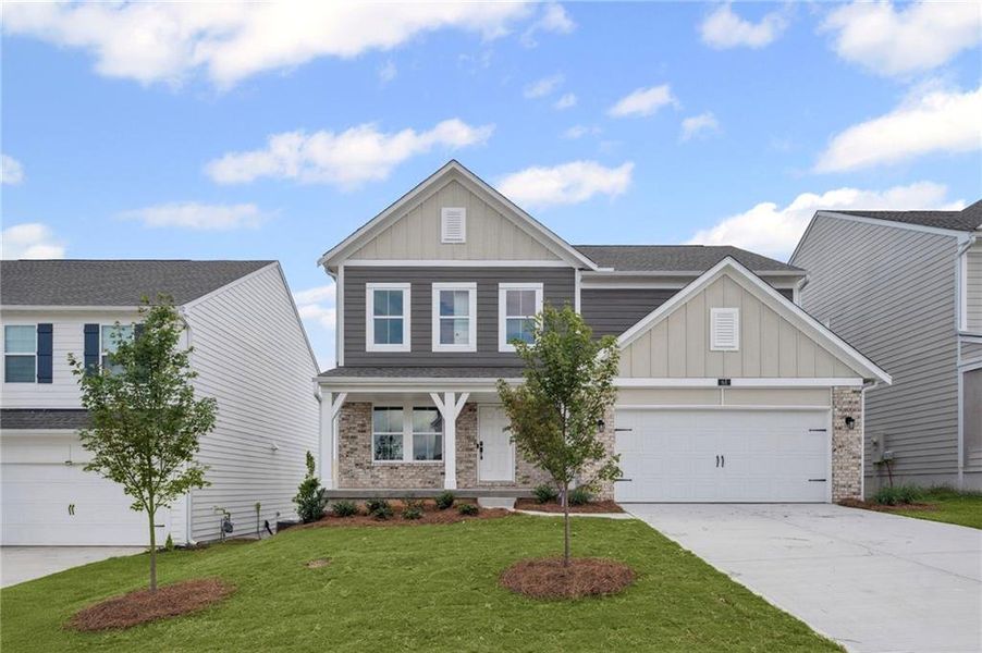 Front exterior of a new home in Twin Lakes, Braselton, GA, highlighting curb appeal (Image 20).