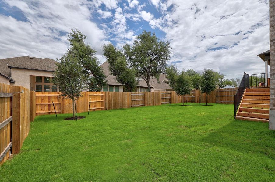 Exterior details and patio area of a home in Parkside On The River, Georgetown (Image 3).