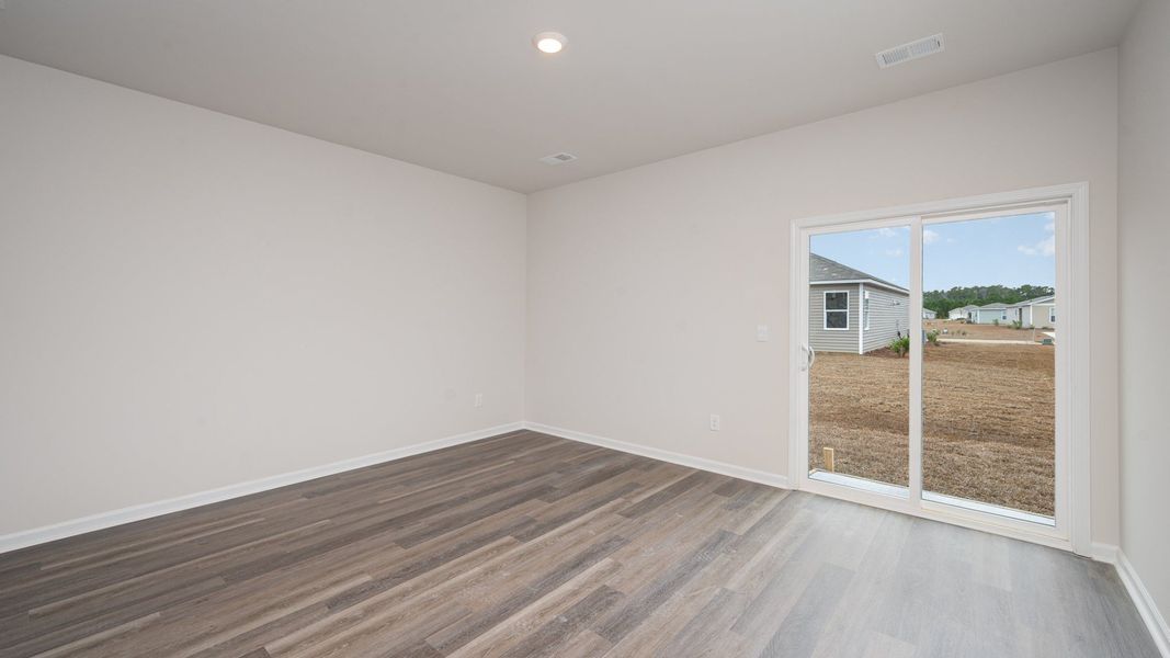 Spacious, unfurnished interior of a new home in Indigo Preserve, Leland (Image 12).