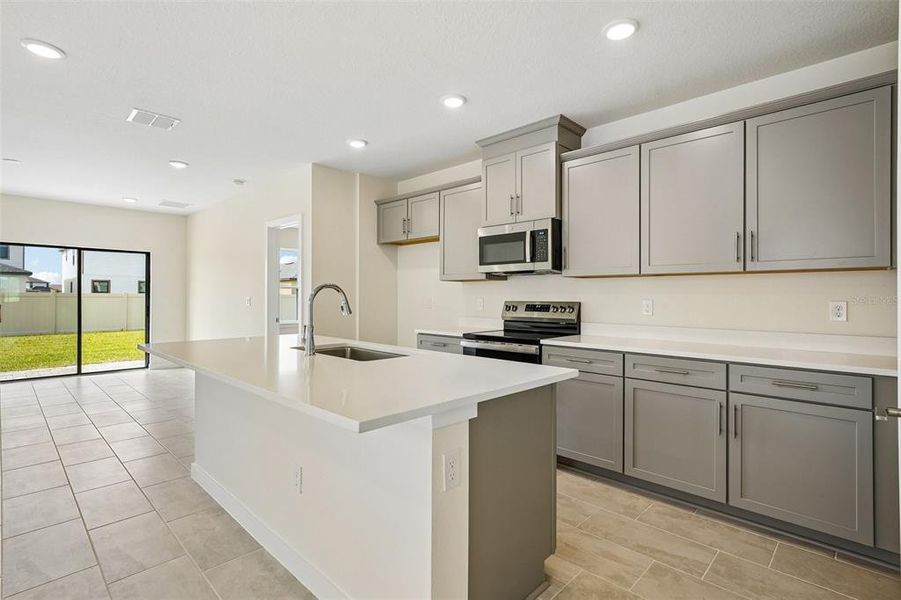 Furnished interior view inside a new home in Grasslands West, Lakeland (Image 13).