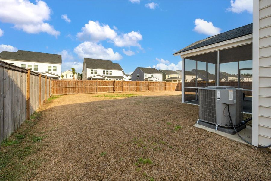 Exterior details and patio area of a home in Sweetgrass at Summers Corner, Summerville (Image 29).