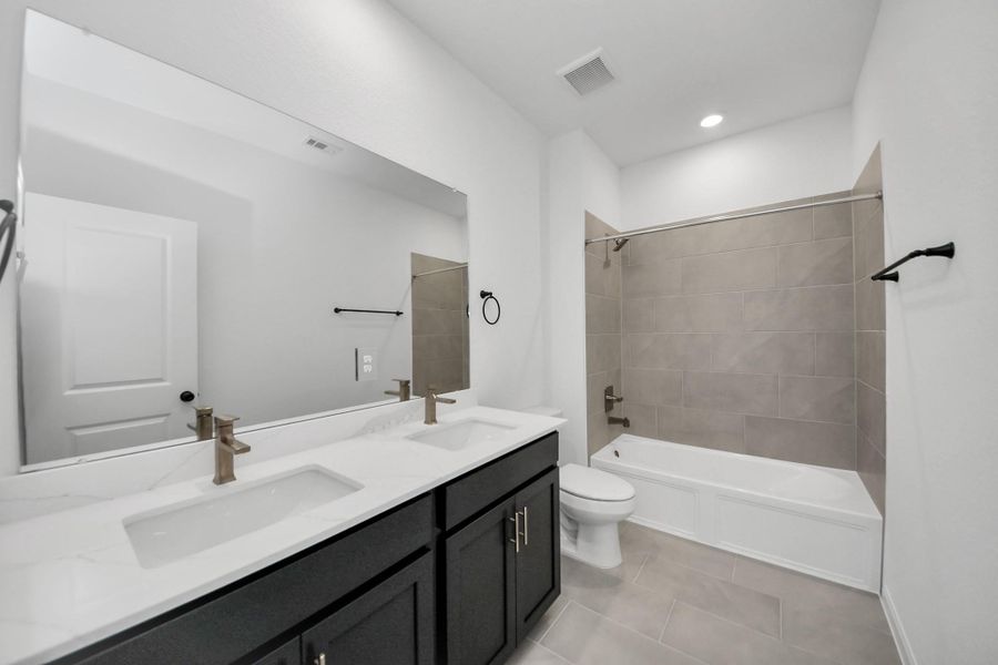 Furnished interior view inside a new home in 50' Traditional Homes at Elyson, Katy (Image 16).