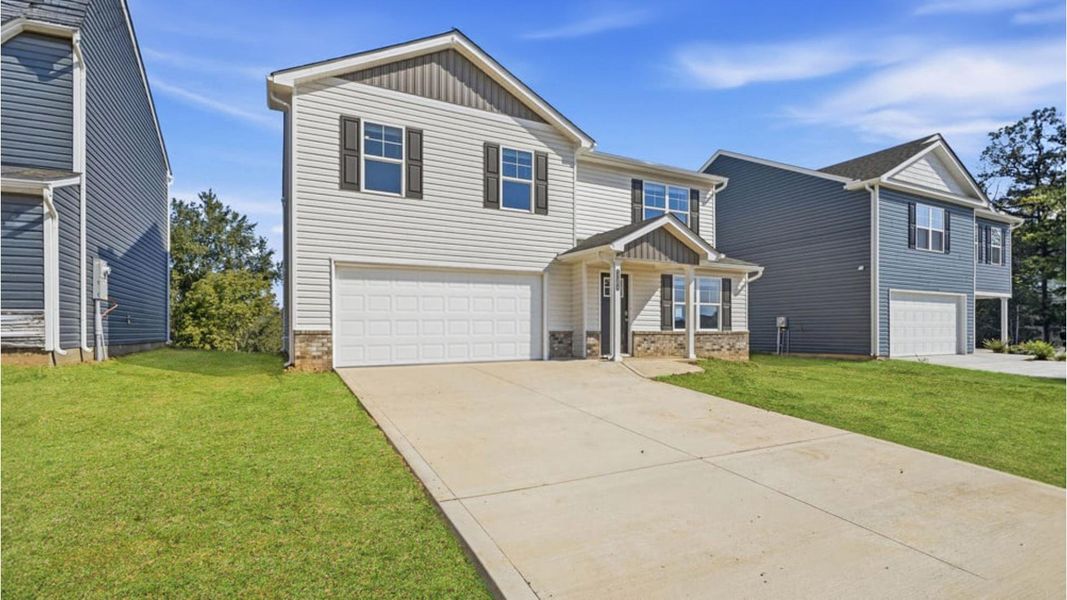 Front exterior of a new home in Johnson Farms, Greeneville, TN, highlighting curb appeal (Image 16).