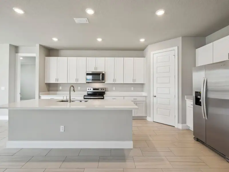 Furnished interior view inside a new home in Brystol at Wylder - Reserve Series, Port St. Lucie (Image 6).