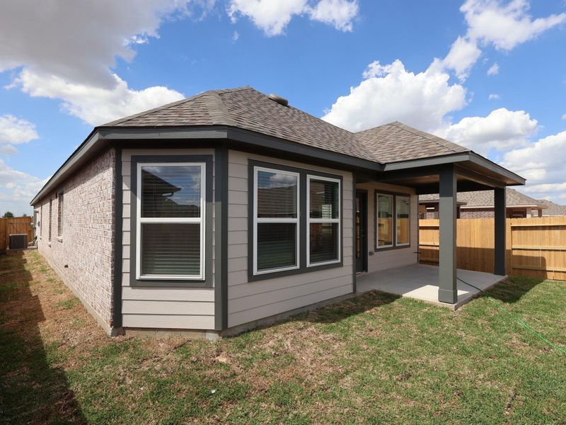 Exterior details and patio area of a home in Marvida, Cypress (Image 20). Exterior details and patio area of a home in Marvida, Cypress (Image 20).