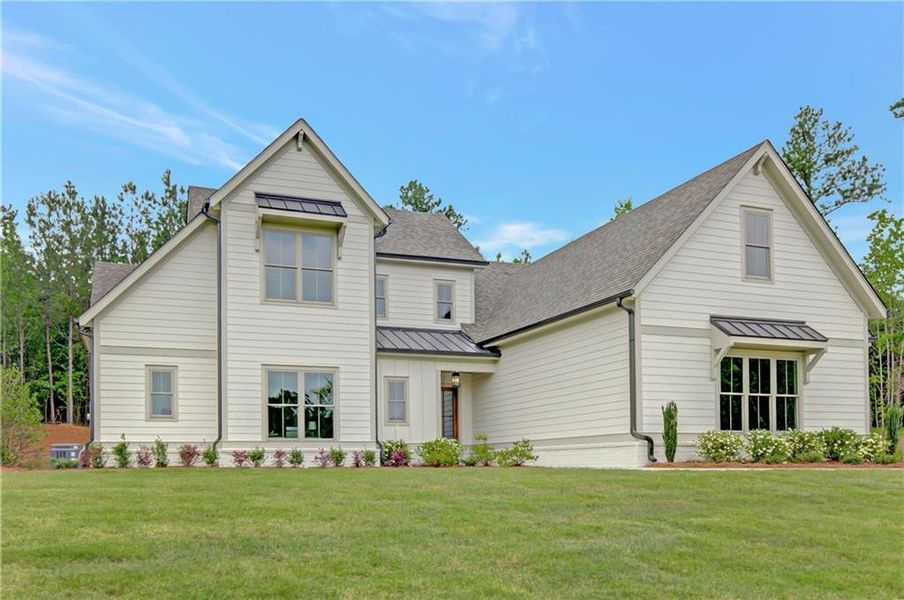 Front exterior of a new home in , Newnan, GA, highlighting curb appeal (Image 24). Front exterior of a new home in , Newnan, GA, highlighting curb appeal (Image 24).
